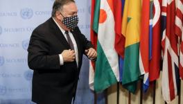 US Secretary of State Mike Pompeo wears a facemask as he departs after meeting with UN Security Council members regarding restoration of sanctions against Iran, United Nations headquarters, New York, August 20, 2020.