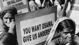 Victims of Bhopal disaster march in September 2006. Credit: Wikimedia Commons. 