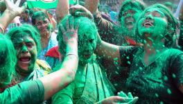 Trinamool Congress (TMC) supporters celebrate the party secures a victory in the West Bengal Municipal elections