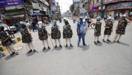 Patna, June 18 (ANI): Rapid Action Force (RAF) and police personnel stand guard during Bihar Bandh that is called to protest against the Agnipath Recruitment Scheme for the Armed Forces, in Patna on Saturday.