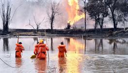 National Disaster Response Team (NDRF) personnel carry out search and rescue operations