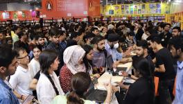 Book lovers visit the World Book Fair on its last day, in New Delhi, Sunday, March 5, 2023.