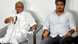 Nationalist Congress Party (NCP) President Sharad Pawar with party MLA Rohit Pawar speaks during a press conference at his residence, in Pune, Sunday, July 2, 2023.