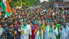 Trinamool Congress Zila Parishad candidate Kajal Sheikh with winning candidates of gram panchayat and panchayat samiti shows victory signs after the announcement of their result in the Panchayat elections outside a counting centre, in Birbhum district, Tuesday, July 11, 2023. 