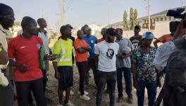 CPM-K members with port workers in Kenya. Photo: CPMK