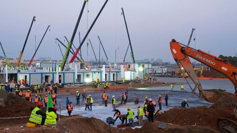 Dozens of bulldozers were used to help build the hospital in Wuhan in 10 days.