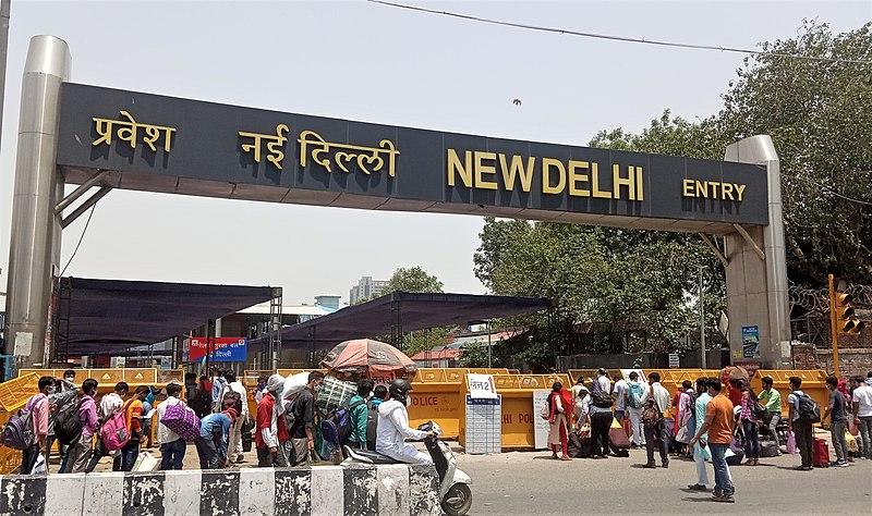 Stranded people rushing to New Delhi rail station to catch their train during fourth phase of the lockdown