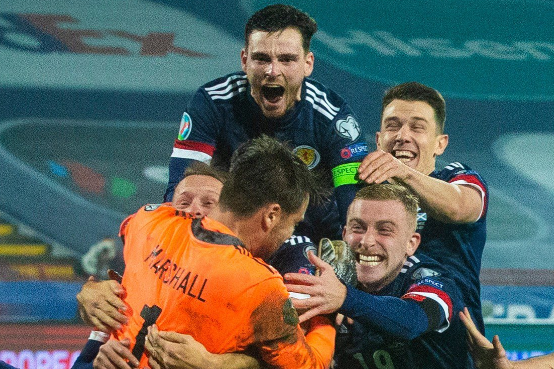 Scotland goalkeeper David Marshall with teammates