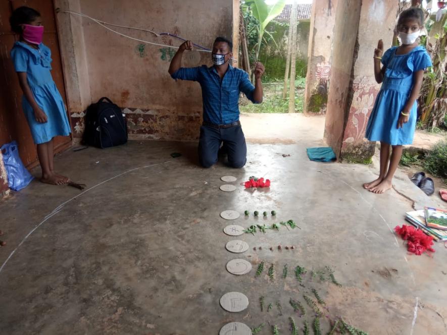 Village Volunteer conducting home-based classes in the village