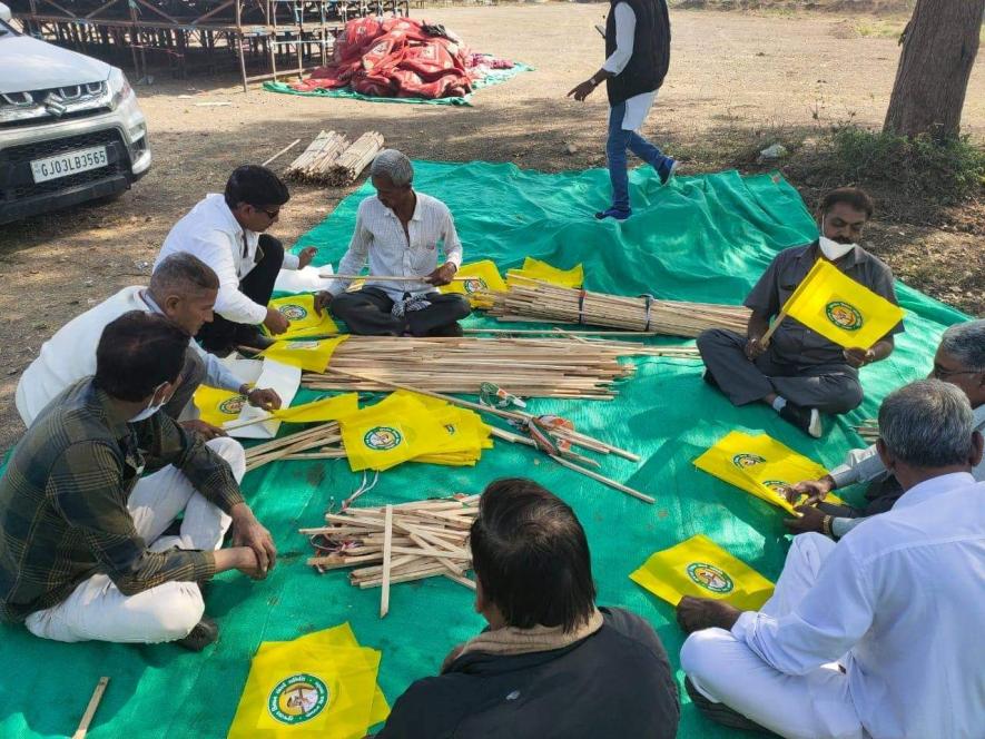 Farmers prepare for meeting at Rajkot on January 27.