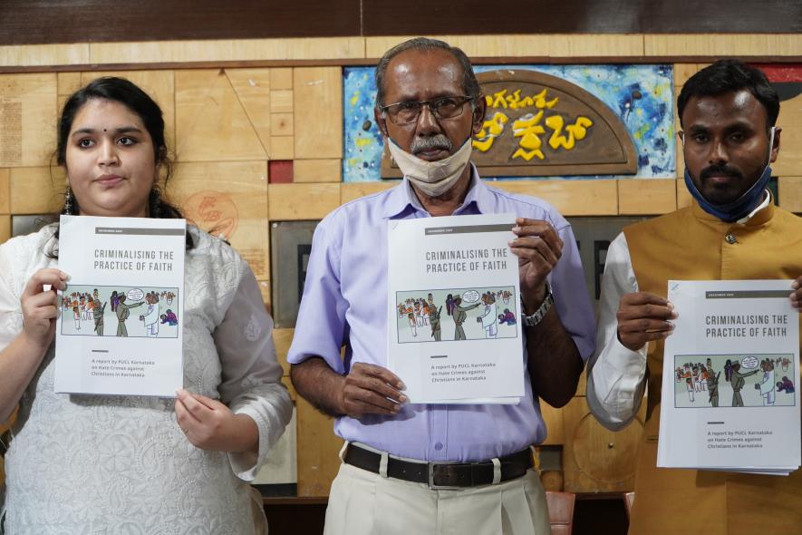 Advocate Manavi of ALF, YJ Rajendra of PUCL and Pastor Lucas present the report