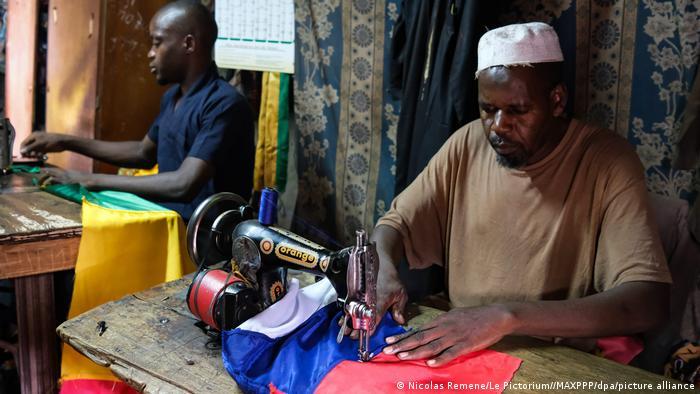 Tailors busy stitching Russian flags to meet rising demand in Bamako, the capital of Mali, December 26, 2021  