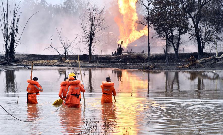 National Disaster Response Team (NDRF) personnel carry out search and rescue operations