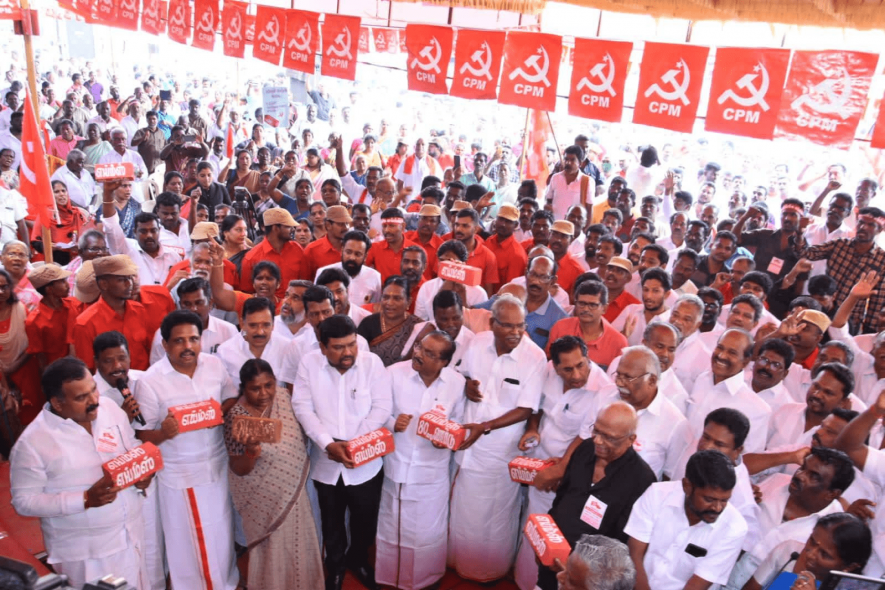 Leaders of CPI(M), DMK, Congress and other people’s representatives protesting with bricks with AIIMS written on it.