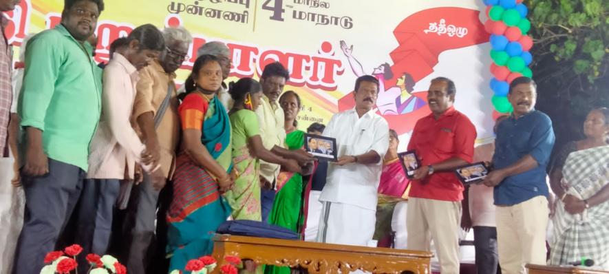 K Radhakrishnan of DSMM honouring the intercaste couples in the public meeting. 