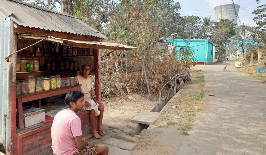 Rabilochon Mondal and debasis Mondal are sitting at deserted village Lotiyaboni