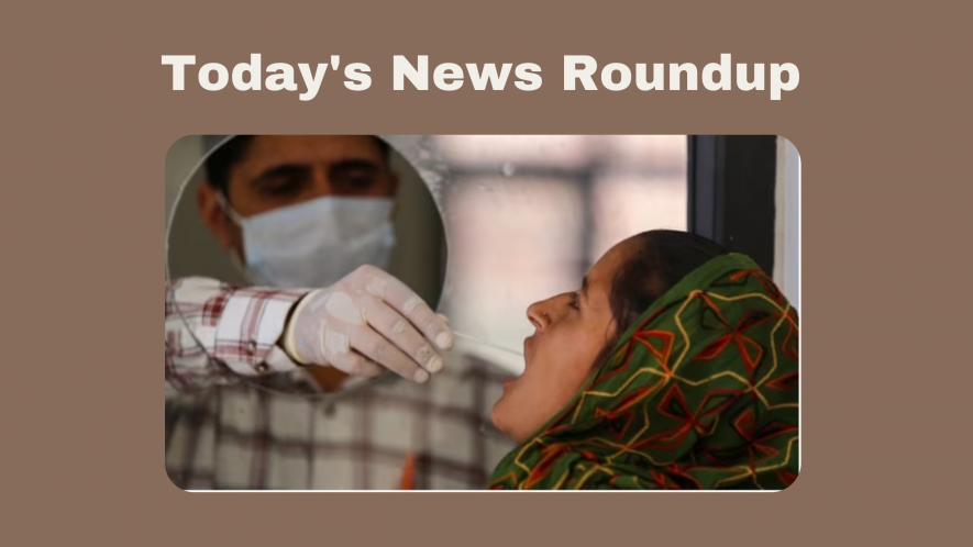 A healthcare worker collects a swab sample of a woman for Covid-19 test, amid a rise in coronavirus cases in the country, in Jammu, Saturday, April 15, 2023.