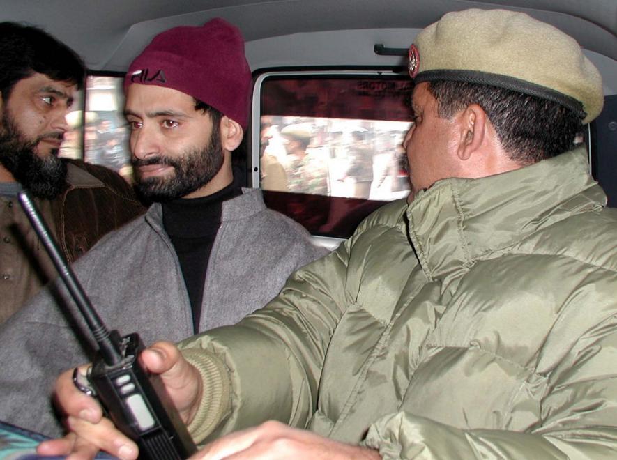 In this Wednesday, Dec. 10, 2003 file photo, Jammu Kashmir Liberation Front Chairman Yasin Malik being taken into preventive custody by police, in Srinagar. The Delhi High Court on Monday, May 29, 2023