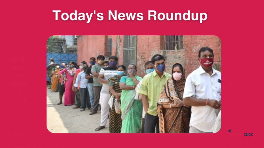 Voters stand in line during polling for the West Bengal assembly elections in Kolkata