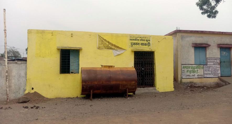 The ration shop at Bakdi's was emptied out and shuttered before the demolitions.jpg