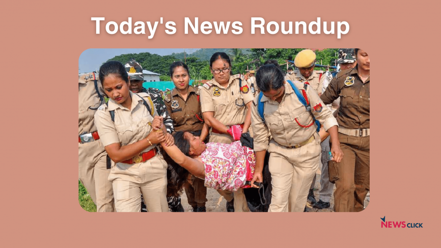 Police personnel arrest a local woman protesting against an eviction drive by Guwahati Metropolitan Development Authority (GMDA) at Silsako Beel, in Guwahati.