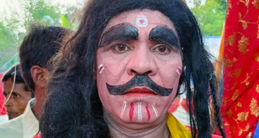 A villager participates in the costume fair. (Photo: Ramji Mishra.