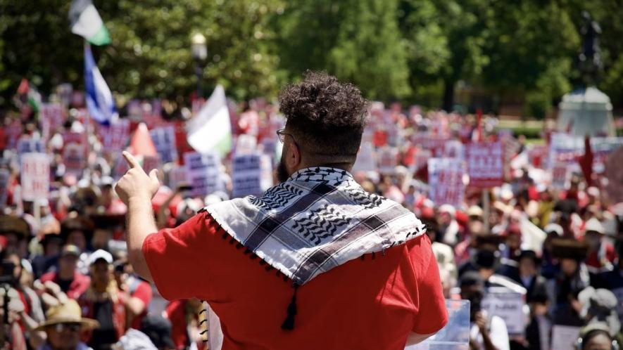 Mohammad, an organizer with PYM, addresses the crowd on June 8. Photo: PYM