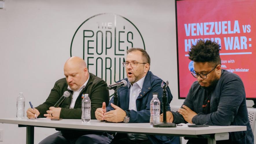 Venezuelan FM Yván Gil Pinto with Carlos Ron and Manolo De Los Santos. Photo: Wyatt Souers