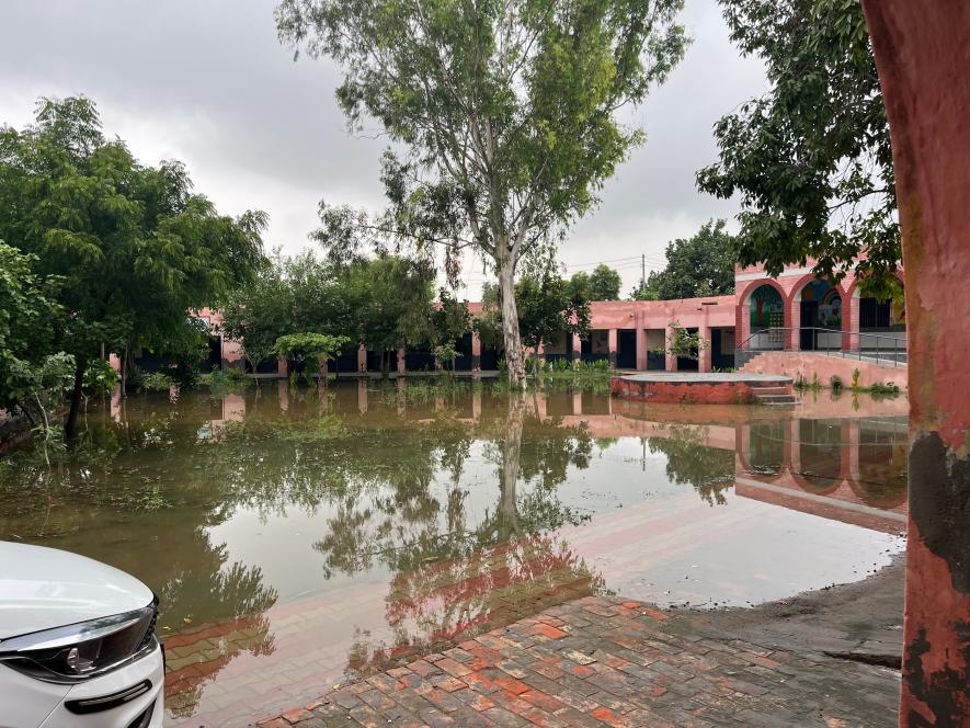 Waterlogged playground at the Government School in Pipli, Haryana.