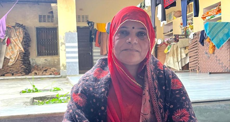 Shyamu Dangi, a Board member at the Ghatawali Mataji Farmer Producer Company seated in her porch in Bichhri village (Photo - Mansi Vijay, 101Reporters) .