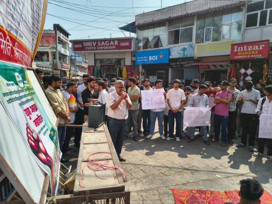 Students protest at Srinagar Garhwal on Wednesday.