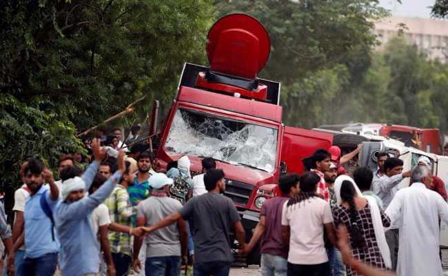 media-attacked-after-ram-rahim-verdict-reuters_650x400_41503670044.jpg